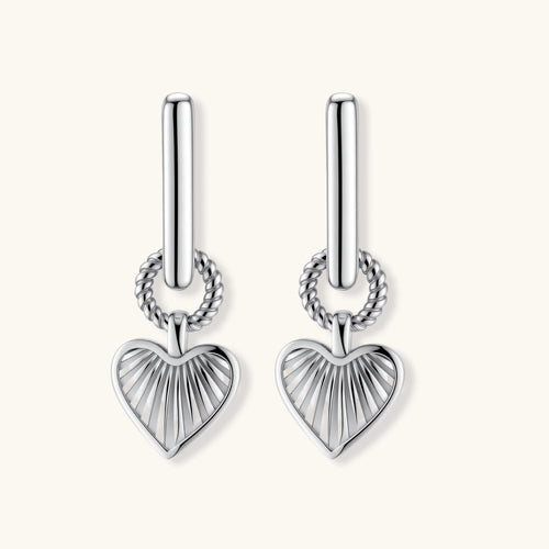 Platinum-plated 925 sterling silver rectangular hoop earrings with twisted ring connector and ribbed heart charm pendant.